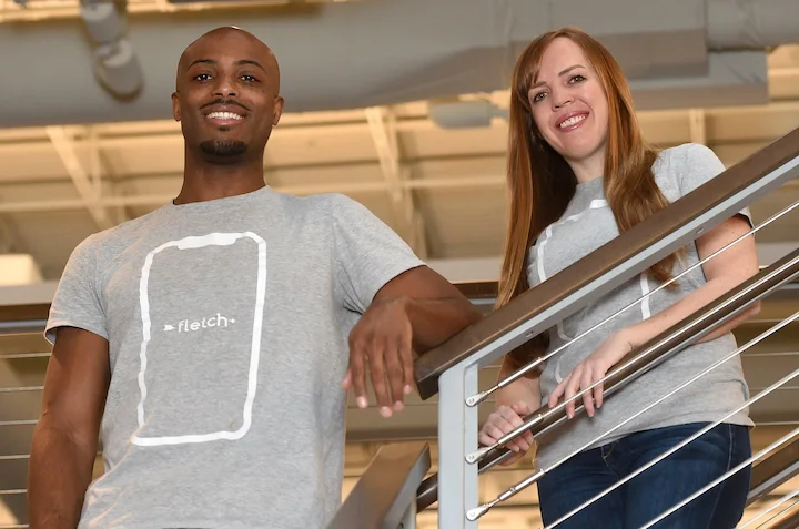 Marquett Davon Burton speaking at a tech event, representing his journey from dropout to multimillionaire entrepreneur.